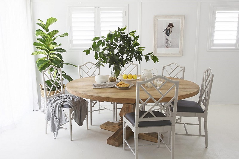 hampton dining table decorated with plants