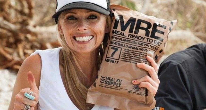 Woman holding a MRE pack